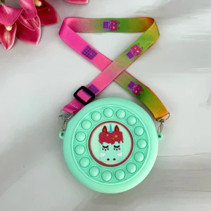 Оптом дитяча сумочка-іграшка pop it (силікон) м.хт207 діаметр-12 ш-3 м'ятний в асортименті - фото 1