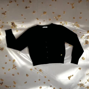 Оптом джемпер жіночий (на гудзиках) м.a5356 р.s/m оптом чорний в асортименті - фото 1