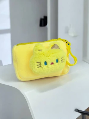 Оптом монетница-брелок Hello Kitty м.3 желтый в ассортименте | Оптом интернет магазин детских кошельков - фото 1