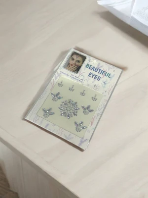 Оптом наліпки-стрази для обличчя м.2715-12/4 сріблястий в асортименті - фото 1
