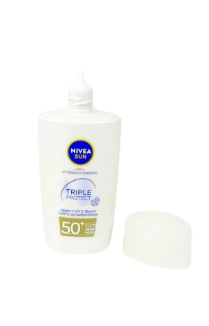 Оптом сонцезахисний флюїд для обличчя "nivea sun" (spf 50+) 40мл. - фото 2